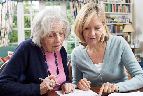 Mom and daughter reviewing post op care instructions.